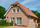 Wohnbereich mit Kamin im Ferienhaus Lejonet in Glowe auf Rügen