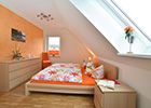 Schlafzimmer 1 im Ferienhaus Lejonet in Glowe auf Rügen