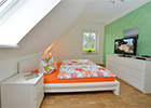 Schlafzimmer 2 im Ferienhaus Lejonet in Glowe auf Rügen